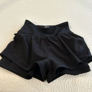 Spanx get moving double layer shorts.